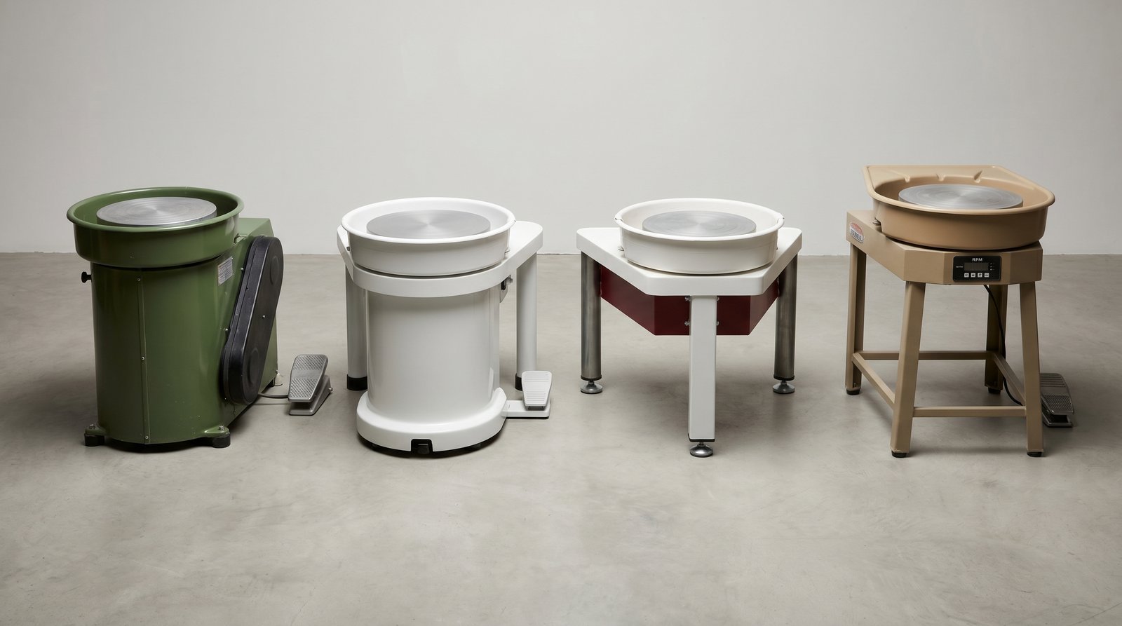 Lineup of four professional pottery wheel brands in 2026 showing distinct styling: olive green Brent, white modern Shimpo, white and red Speedball Big Boss, and tan Skutt Thomas Stuart with RPM digital display